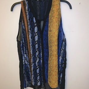 Pattern see through button down blouse. Size: L.